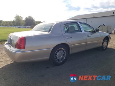 Trzecie zdjęcie samochodu z tyłu: 2006 LINCOLN TOWN CAR DESIGNER VIN:1LNHM83V76Y630343 - miniatura