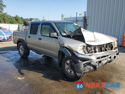 Czwarte zdjęcie samochodu z boku: 2000 NISSAN FRONTIER CREW CAB XE VIN:1N6ED27Y6YC327396 - miniatura