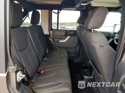 Zdjęcie 11 z 16 samochodu: 2017 JEEP WRANGLER UNLIMITED SAHARA VIN:1C4HJWEG8HL596364 - miniatura