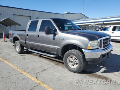 Czwarte zdjęcie samochodu z boku: 2003 FORD F250 SUPER DUTY VIN:1FTNW21L13ED46106 - miniatura