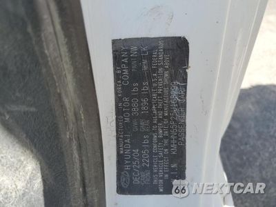 Zdjęcie 12 z 12 samochodu: 2005 HYUNDAI TIBURON VIN:KMHHN65F25U168299 - miniatura