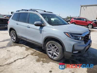 Czwarte zdjęcie samochodu z boku: 2023 HONDA PASSPORT EXL VIN:5FNYF8H56PB021768 - miniatura