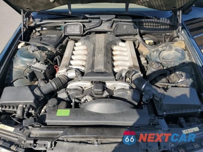 Zdjęcie 11 z 14 samochodu: 1997 BMW 750 IL VIN:WBAGK2329VDH68142 - miniatura