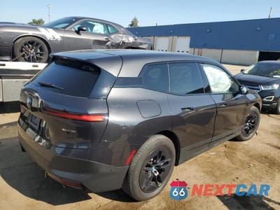 Trzecie zdjęcie samochodu z tyłu: 2024 BMW IX XDRIVE50 VIN:WB523CF01RCN79774 - miniatura