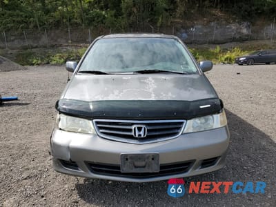 Piąte zdjęcie samochodu w środku: 2002 HONDA ODYSSEY EXL VIN:2HKRL18092H511642 - miniatura