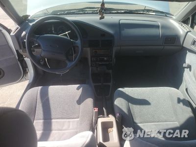 Zdjęcie 8 z 14 samochodu: 1996 FORD ESCORT LX VIN:3FASP13J6TR107918 - miniatura