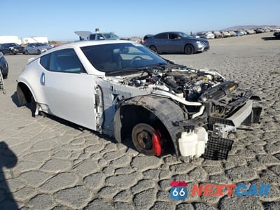 Czwarte zdjęcie samochodu z boku: 2015 NISSAN 370Z BASE VIN:JN1AZ4EH6FM443628 - miniatura