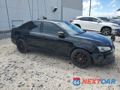 Czwarte zdjęcie samochodu z boku: 2011 VOLKSWAGEN JETTA SE VIN:3VWDX7AJ3BM309410 - miniatura