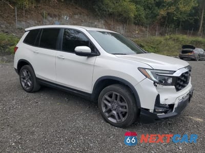 Czwarte zdjęcie samochodu z boku: 2023 HONDA PASSPORT EXL VIN:5FNYF8H52PB013344 - miniatura