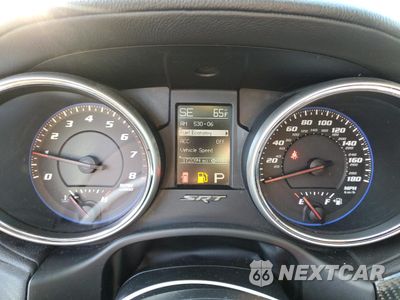 Zdjęcie 9 z 13 samochodu: 2013 JEEP GRAND CHEROKEE SRT-8 VIN:1C4RJFDJ4DC586121 - miniatura