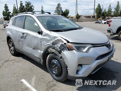 Czwarte zdjęcie samochodu z boku: 2018 TOYOTA RAV4 ADVENTURE VIN:JTMRFREV7JJ217992 - miniatura