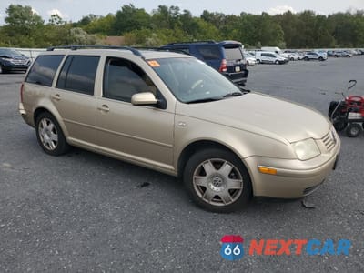 Czwarte zdjęcie samochodu z boku: 2001 VOLKSWAGEN JETTA GLX VIN:WVWTG61JX1W601157 - miniatura