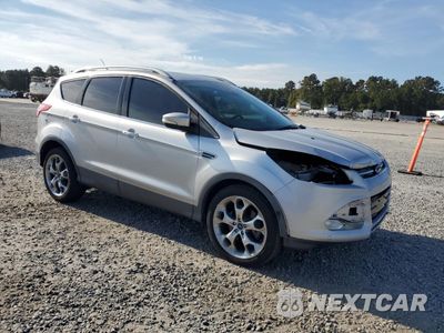 Czwarte zdjęcie samochodu z boku: 2014 FORD ESCAPE TITANIUM VIN:1FMCU0J90EUC22614 - miniatura