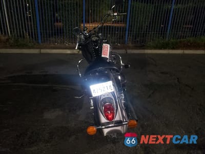 Czwarte zdjęcie samochodu z boku: 2003 KAWASAKI VN1600 A1 VIN:JKBVNKA133A002291 - miniatura