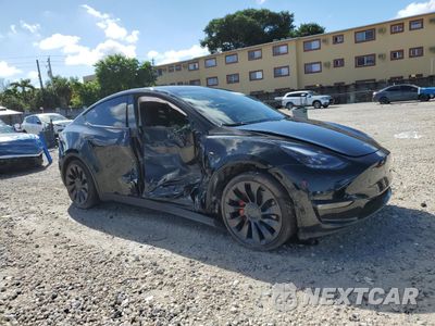 Czwarte zdjęcie samochodu z boku: 2023 TESLA MODEL Y VIN:7SAYGDEF0PF660573 - miniatura