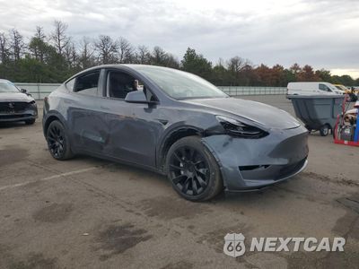 Czwarte zdjęcie samochodu z boku: 2023 TESLA MODEL Y VIN:7SAYGDEE6PF693505 - miniatura