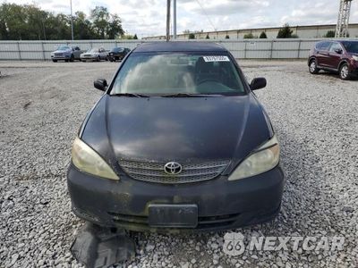 Piąte zdjęcie samochodu w środku: 2004 TOYOTA CAMRY LE VIN:4T1BE32K24U355031 - miniatura