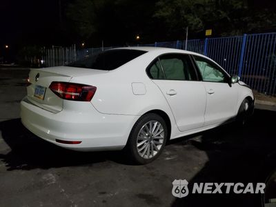 Trzecie zdjęcie samochodu z tyłu: 2016 VOLKSWAGEN JETTA SEL VIN:3VWL17AJ4GM231255 - miniatura