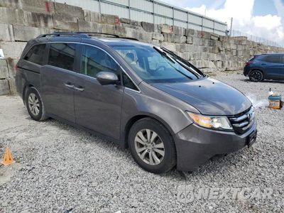 Czwarte zdjęcie samochodu z boku: 2016 HONDA ODYSSEY EXL VIN:5FNRL5H61GB030477 - miniatura