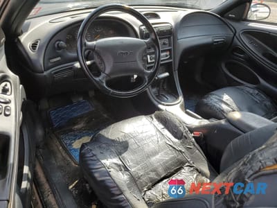 Zdjęcie 8 z 12 samochodu: 1996 FORD MUSTANG GT VIN:1FALP42X8TF107945 - miniatura