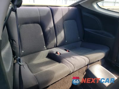 Zdjęcie 10 z 14 samochodu: 2005 HYUNDAI TIBURON VIN:KMHHM65D65U178514 - miniatura