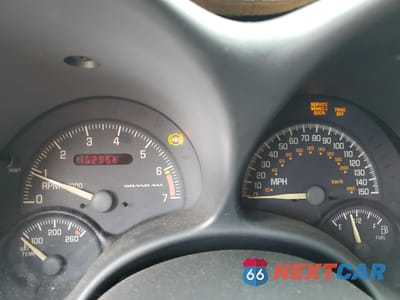 Zdjęcie 9 z 13 samochodu: 2000 PONTIAC GRAND AM GT VIN:1G2NW52E5YC550660 - miniatura