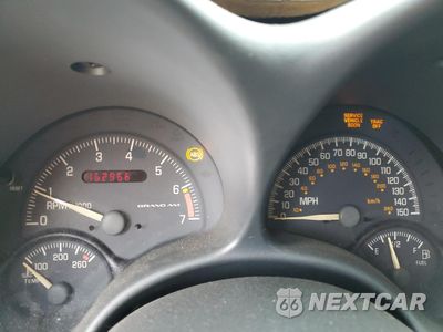 Zdjęcie 9 z 13 samochodu: 2000 PONTIAC GRAND AM GT VIN:1G2NW52E5YC550660 - miniatura