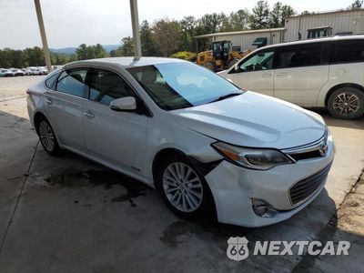 Czwarte zdjęcie samochodu z boku: 2014 TOYOTA AVALON HYBRID VIN:4T1BD1EB4EU025055 - miniatura