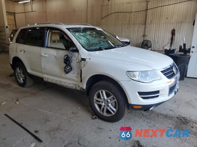 Czwarte zdjęcie samochodu z boku: 2009 VOLKSWAGEN TOUAREG 2 V6 VIN:WVGBE77L39D015161 - miniatura