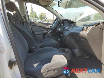 Zdjęcie 7 z 12 samochodu: 2001 FORD FOCUS LX VIN:1FAFP33PX1W294849 - miniatura