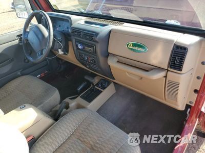 Zdjęcie 8 z 14 samochodu: 1999 JEEP WRANGLER / TJ SPORT VIN:1J4FY19S8XP480961 - miniatura