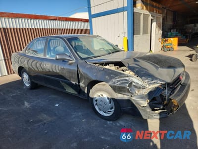 Czwarte zdjęcie samochodu z boku: 1995 TOYOTA CAMRY DX VIN:4T1SK11EXSU639528 - miniatura