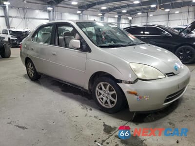 Czwarte zdjęcie samochodu z boku: 2003 TOYOTA PRIUS BASE VIN:JT2BK18U030079232 - miniatura