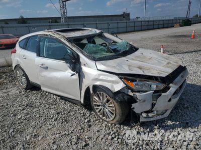 Czwarte zdjęcie samochodu z boku: 2016 FORD FOCUS TITANIUM VIN:1FADP3N29GL303527 - miniatura