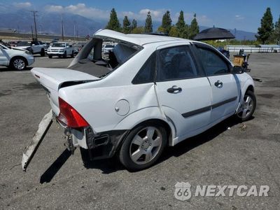 Trzecie zdjęcie samochodu z tyłu: 2001 FORD FOCUS LX VIN:1FAFP33PX1W294849 - miniatura