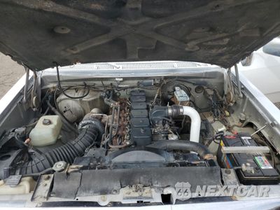 Zdjęcie 12 z 14 samochodu: 1991 DODGE D-SERIES D200 VIN:1B7KE26C1MS323491 - miniatura