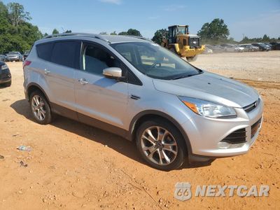 Czwarte zdjęcie samochodu z boku: 2014 FORD ESCAPE TITANIUM VIN:1FMCU0JX3EUC41706 - miniatura