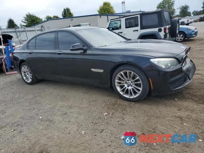 Czwarte zdjęcie samochodu z boku: 2015 BMW 740 LXI VIN:WBAYF4C54FGS99442 - miniatura