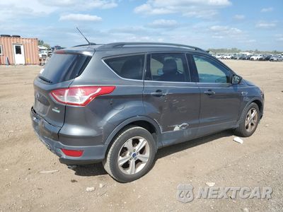 Trzecie zdjęcie samochodu z tyłu: 2016 FORD ESCAPE SE VIN:1FMCU0GXXGUC09541 - miniatura