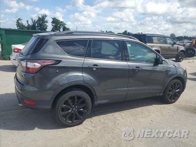 Trzecie zdjęcie samochodu z tyłu: 2017 FORD ESCAPE TITANIUM VIN:1FMCU0J98HUC37365 - miniatura