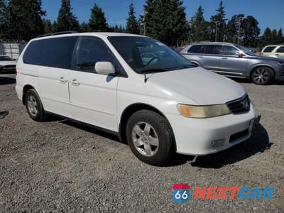 Czwarte zdjęcie samochodu z boku: 2002 HONDA ODYSSEY EX VIN:2HKRL18672H536236 - miniatura