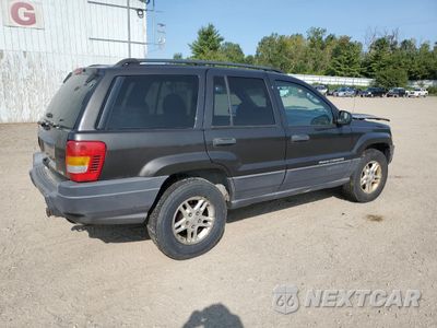 Trzecie zdjęcie samochodu z tyłu: 2004 JEEP GRAND CHEROKEE LAREDO VIN:1J4GW48N44C389275 - miniatura