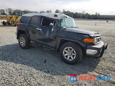 Czwarte zdjęcie samochodu z boku: 2014 TOYOTA FJ CRUISER VIN:JTEZU4BF9EK013552 - miniatura