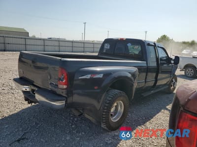 Trzecie zdjęcie samochodu z tyłu: 1999 FORD F350 SUPER DUTY VIN:1FTWX33F6XEF08638 - miniatura