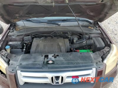 Zdjęcie 12 z 14 samochodu: 2007 HONDA PILOT EXL VIN:5FNYF28617B032263 - miniatura