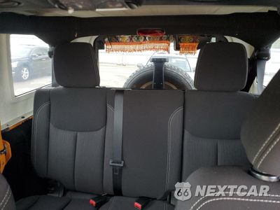 Zdjęcie 10 z 13 samochodu: 2013 JEEP WRANGLER UNLIMITED SAHARA VIN:1C4HJWEGXDL515262 - miniatura