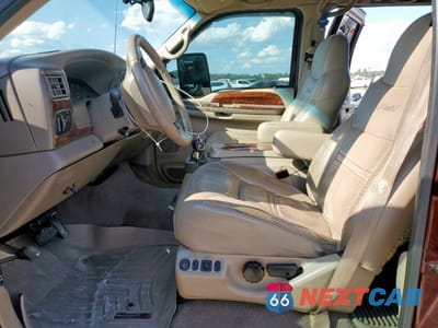 Zdjęcie 7 z 11 samochodu: 2000 FORD EXCURSION LIMITED VIN:1FMSU43F2YEB85067 - miniatura