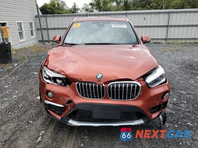 Piąte zdjęcie samochodu w środku: 2018 BMW X1 XDRIVE28I VIN:WBXHT3C32J5F89578 - miniatura