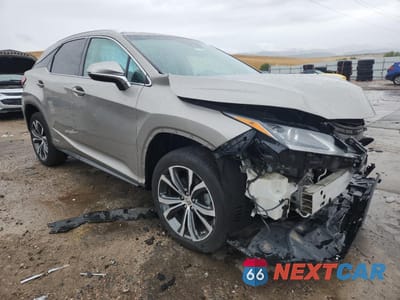 Czwarte zdjęcie samochodu z boku: 2017 LEXUS RX 450H BASE VIN:2T2BGMCA0HC018981 - miniatura