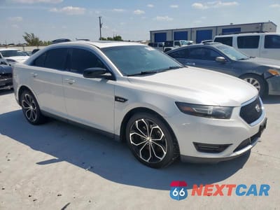 Czwarte zdjęcie samochodu z boku: 2015 FORD TAURUS SHO VIN:1FAHP2KT4FG100500 - miniatura